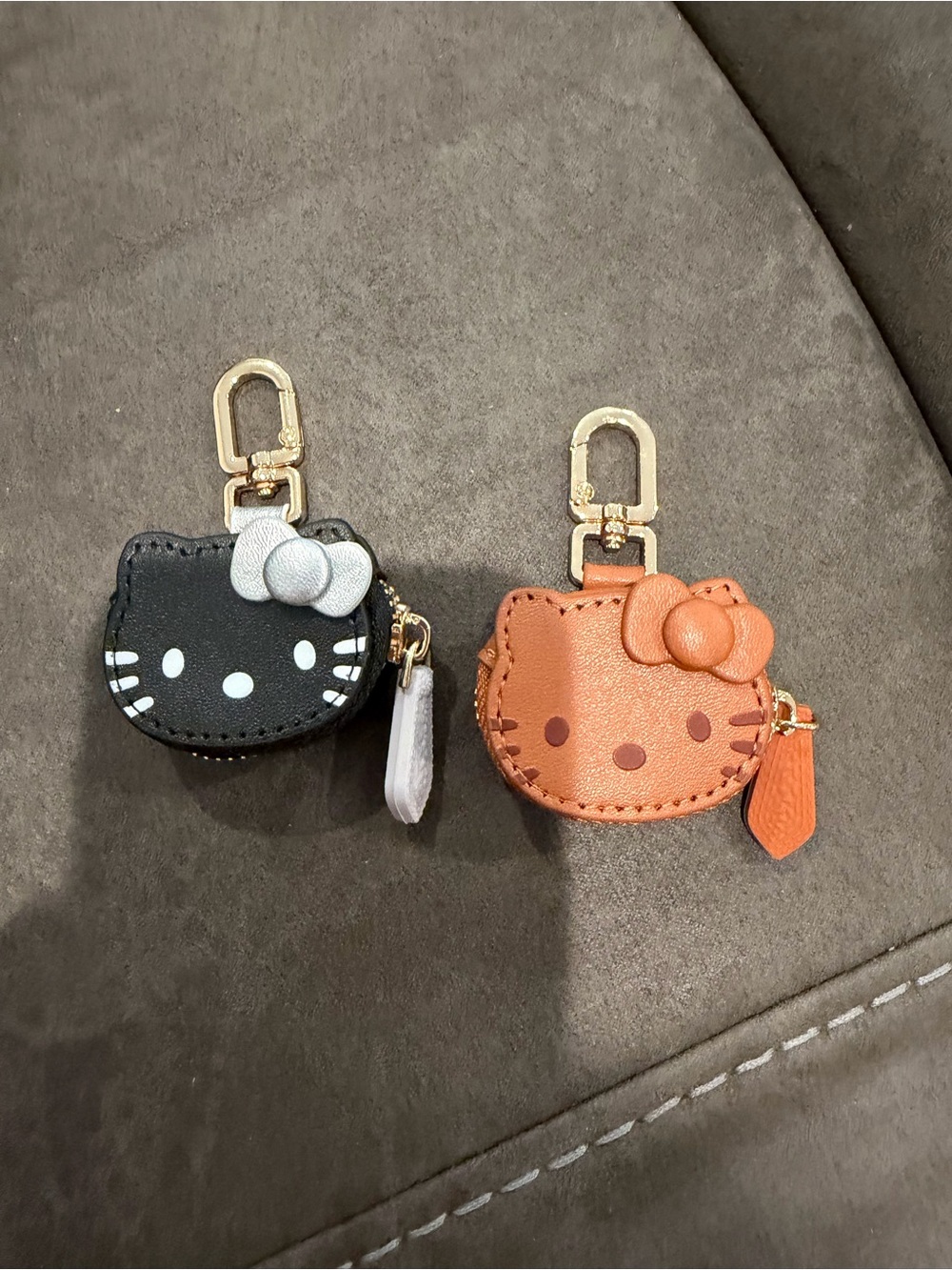 Hello Kitty Dual Leather Keychain Charms in Black and Orange